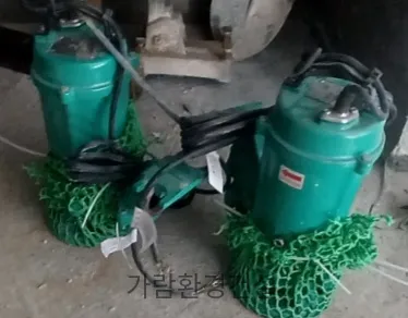 유량펌프 (그물망 보호 설치)